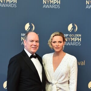 Le prince Albert II de Monaco et la princesse Charlene (en robe Louis Vuitton) au photocall de la cérémonie de remise des Nymphes d'or du 59e Festival de Télévision de Monte-Carlo le 18 juin 2019 au Grimaldi Forum à Monaco. © Bruno Bebert/Bestimage