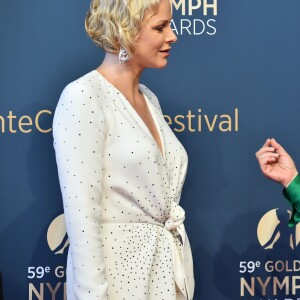 La princesse Charlene de Monaco avec l'actrice Patricia Arquette lors du photocall de la cérémonie de remise des Nymphes d'or du 59e Festival de Télévision de Monte-Carlo le 18 juin 2019 au Grimaldi Forum à Monaco. © Bruno Bebert/Bestimage