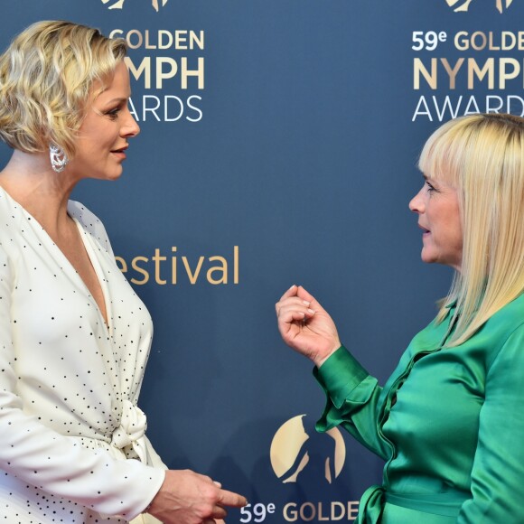 La princesse Charlene de Monaco avec l'actrice Patricia Arquette lors du photocall de la cérémonie de remise des Nymphes d'or du 59e Festival de Télévision de Monte-Carlo le 18 juin 2019 au Grimaldi Forum à Monaco. © Bruno Bebert/Bestimage