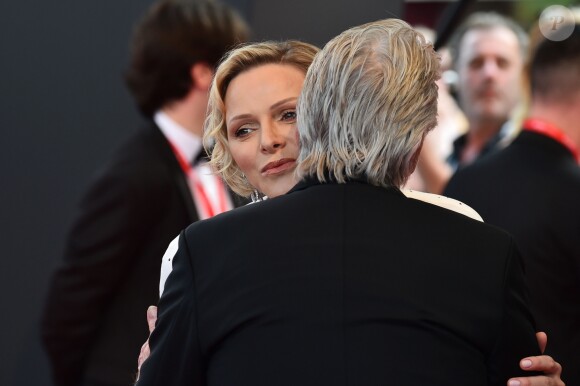 La princesse Charlene et le prince Albert II de Monaco rencontrant Michael Douglas lors du photocall de la cérémonie de remise des Nymphes d'or du 59e Festival de Télévision de Monte-Carlo le 18 juin 2019 au Grimaldi Forum à Monaco. © Bruno Bebert/Bestimage