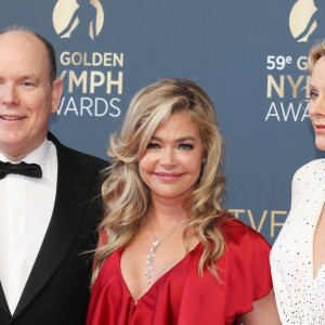 L'actrice Denise Richards posant entre le prince Albert II de Monaco et la princesse Charlene lors de la cérémonie de remise des Nymphes d'or du 59e Festival de Télévision de Monte-Carlo le 18 juin 2019 au Grimaldi Forum à Monaco. © Denis Guignebourg/Bestimage