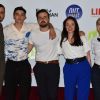 L'équipe de Skam France entourée des coprésidents de l'AJL, Clément Giuliano et Clémence Allezard, au photocall de la 3e cérémonie des Out d'Or, qui célèbrent la visibilité des personnes LGBTI, au Cabaret Sauvage le 18 juin 2019.