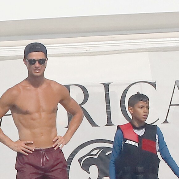 Cristiano Ronaldo et son fils Cristiano Jr en vacances à Saint-Tropez le 23 juin 2019.