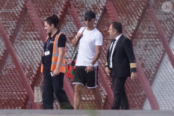 Exclusif - Cristiano Ronaldo, sa compagne Georgina Rodriguez et ses enfants Alana Martina dos Santos Aveiro, Cristiano Jr, Eva Maria Dos Santos, Mateo Ronaldo embarquent dans un jet privé après avoir passé une semaine au dans l'hôtel cinq étoiles Westin Resort Costa Navarino, à l'aéroport de Kalamata en Grèce, le 18 juin 2019.