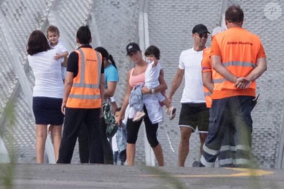 Exclusif - Cristiano Ronaldo, sa compagne Georgina Rodriguez et ses enfants Alana Martina dos Santos Aveiro, Cristiano Jr, Eva Maria Dos Santos, Mateo Ronaldo embarquent dans un jet privé après avoir passé une semaine au dans l'hôtel cinq étoiles Westin Resort Costa Navarino, à l'aéroport de Kalamata en Grèce, le 18 juin 2019.
