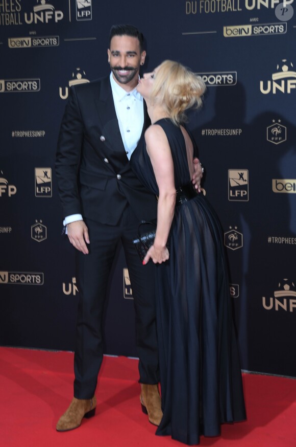 Adil Rami et Pamela Anderson au photocall de la 28ème cérémonie des trophées UNFP (Union nationale des footballeurs professionnels) au Pavillon d'Armenonville à Paris, France, le 19 mai 2019. © Coadic Guirec/Bestimage