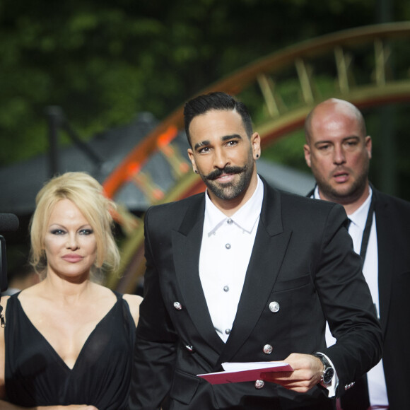 Adil Rami et Pamela Anderson arrivent à la 28ème cérémonie des trophées UNFP (Union nationale des footballeurs professionnels) au Pavillon d'Armenonville à Paris, France, le 19 mai 2019.