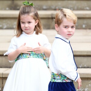 La princesse Charlotte de Cambridge, le prince George - Sorties après la cérémonie de mariage de la princesse Eugenie d'York et Jack Brooksbank en la chapelle Saint-George au château de Windsor le 12 octobre 2018. La princesse Charlotte de Cambridge, le prince George de Cambridge - Cérémonie de mariage de la princesse Eugenie d'York et Jack Brooksbank en la chapelle Saint-George au château de Windsor le 12 octobre 2018.