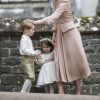 Catherine (Kate) Middleton, duchesse de Cambridge avec son fils le prince George de Cambridge et sa fille la princesse Charlotte de Cambridge - Mariage de P. Middleton et J. Matthew, en l'église St Mark Englefield, Berkshire, Royaume Uni, le 20 mai 2017.