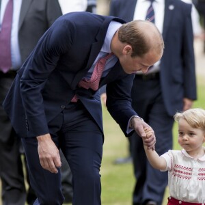 Le prince William, le prince George de Cambridge - Sorties après le baptême de la princesse Charlotte de Cambridge à l'église St. Mary Magdalene à Sandringham, le 5 juillet 2015.