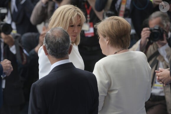 Première dame Brigitte Macron, Angela Merkel (chancelière d'Allemagne) et son mari Joachim Sauer lors du 139ème défilé militaire du 14 Juillet sur les Champs-Elysées, le jour de la Fête Nationale. Paris, le 14 juillet 2019. © Lemouton-Gorassini-Perusseau/Bestimage