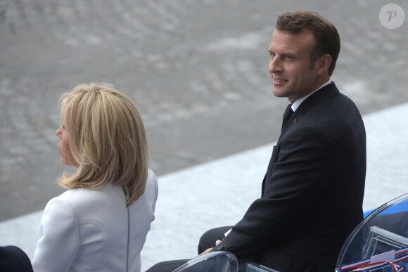 Emmanuel Macron (président de la République Française) et sa femme Brigitte Macron lors du 139ème défilé militaire du 14 Juillet sur les Champs-Elysées, le jour de la Fête Nationale. Paris, le 14 juillet 2019. © Lemouton-Gorassini-Perusseau/Bestimage