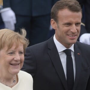 Emmanuel Macron, président de la République Française, Angela Merkel (chancelière d'Allemagne), lors du 139ème défilé militaire du 14 Juillet sur les Champs-Elysées, le jour de la Fête Nationale. Paris, le 14 juillet 2019. © Lemouton-Gorassini-Perusseau/Bestimage