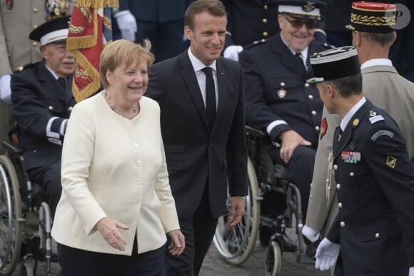 Emmanuel Macron, président de la République Française, Angela Merkel (chancelière d'Allemagne), lors du 139ème défilé militaire du 14 Juillet sur les Champs-Elysées, le jour de la Fête Nationale. Paris, le 14 juillet 2019. © Lemouton-Gorassini-Perusseau/Bestimage
