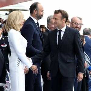 Emmanuel Macron, président de la République Française, et la Première dame Brigitte Macron, Edouard Philippe, Premier ministre, lors du 139ème défilé militaire du 14 juillet sur les Champs-Elysées, jour de la Fête Nationale. Paris, le 14 juillet 2019. © Stéphane Lemouton/Bestimage