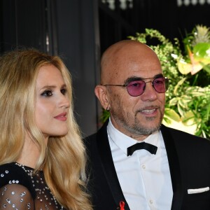 Pascal Obispo et sa femme Julie Hantson à la 17ème édition du "Dîner de la mode du Sidaction" au Pavillon d'Armenonville à Paris, France, le 24 janvier 2019. Depuis 2003, ce dîner permet de montrer l'engagement indéfectible du monde de la mode en faveur de la lutte contre le sida. © Rachid Bellak/Bestimage