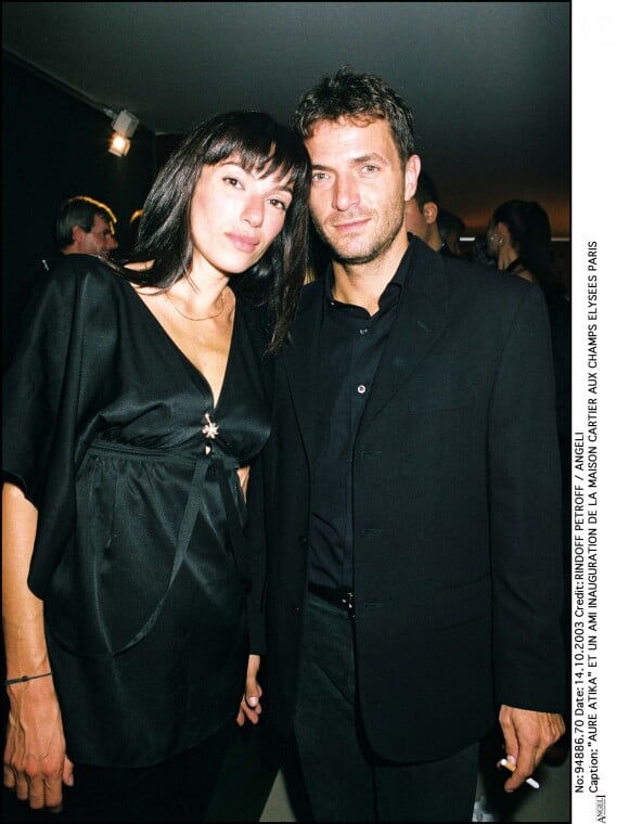 Aure Atika et Philippe "Zdar" lors de l'inauguration de la maison Cartier aux Champs-Élysées, le 14 octobre 2003.