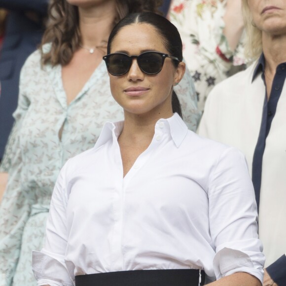 Catherine (Kate) Middleton, duchesse de Cambridge, Meghan Markle, duchesse de Sussex, et Pippa Middleton dans les tribunes lors de la finale femme de Wimbledon "Serena Williams - Simona Halep (2/6 - 2/6) à Londres, le 13 juillet 2019.