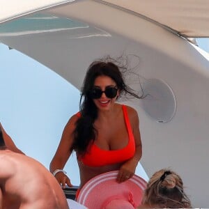 Lionel Messi, sa femme Antonella Roccuzzo, Luis Suarez, sa femme Daniella Semaan et Cesc Fabregas passent leurs vacances en famille à Formentera en Espagne le 29 juillet 2019.