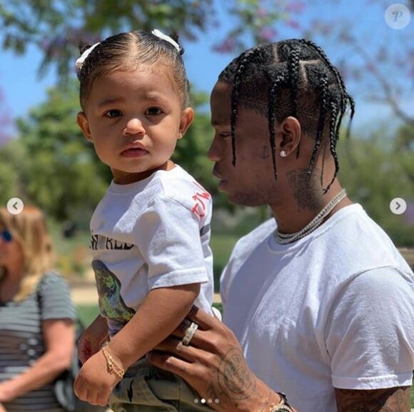 Travis Scott et sa fille Stormi. Juin 2019.