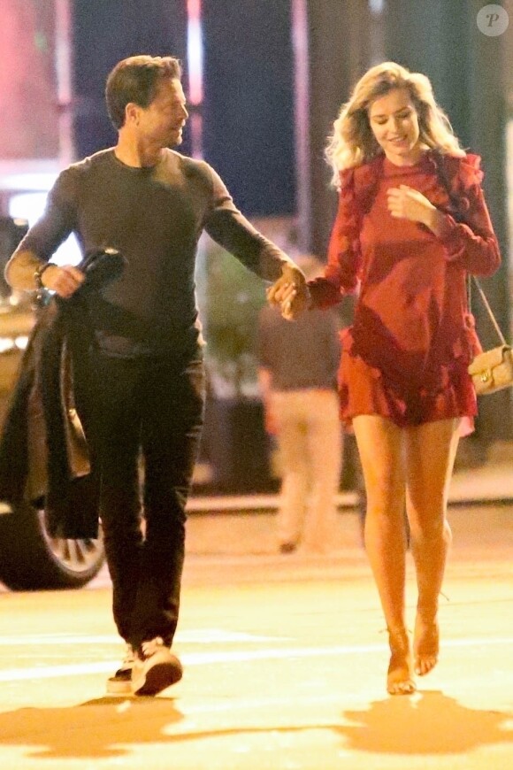 Exclusif - David Charvet et Anna Tarnowska à la sortie du club Raspoutine à Los Angeles le 2 mai 2019.