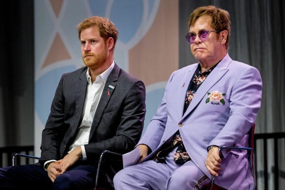 Elton John et le prince Harry participent à la conférence internationale "AIDS" à Amsterdam aux Pays-Bas le 24 juillet 2018.