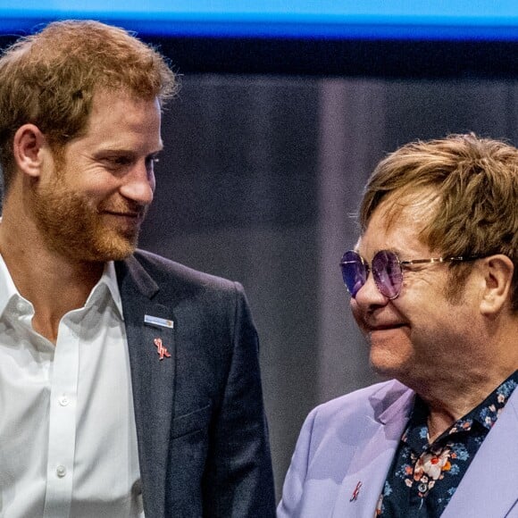 Elton John et le prince Harry participent à la conférence internationale "AIDS" à Amsterdam aux Pays-Bas le 24 juillet 2018.