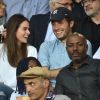 Vianney Bureau (Vianney), sa compagne Catherine Robert et Harry Roselmack dans les tribunes lors du match de championnat de Ligue 1 Conforama opposant le Paris Saint-Germain au Toulouse FC au parc des Princes à Paris, France, le 25 août 2019. Le PSG a gagné 4-0. © Giancarlo Gorassini/Bestimage