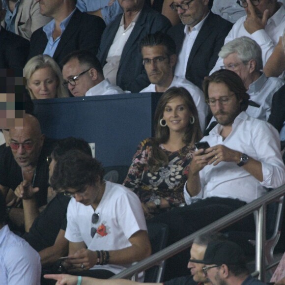 Ophélie Meunier et son mari Mathieu dans les tribunes lors du match de championnat de Ligue 1 Conforama opposant le Paris Saint-Germain au Toulouse FC au parc des Princes à Paris, France, le 25 août 2019. Le PSG a gagné 4-0. © Giancarlo Gorassini/Bestimage