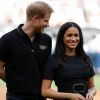 Le prince Harry et Meghan Markle, duchesse de Sussex, ont salué les Boston Red Sox et les New York Yankees dans le cadre des Invictus Games 2019 au London Stadium le 29 juin 2019.
