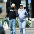 Exclusif - Amber Rose enceinte et son compagnon Alexander Edwards se rendent au restaurant Norms à Los Angeles, le 11 septembre 2019. Elle porte un look décontracté, sweat-shirt gris et baskets blanches.