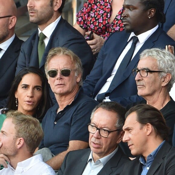 Franck Dubosc, sa femme Danièle, Raymond Domenech et sa femme Estelle Denis dans les tribunes lors du match de championnat de Ligue 1 Conforama opposant le Paris Saint-Germain au Racing Club de Strasbourg Alsace au Parc des princes à Paris, France, le 14 septembre 2019. Le PSG a gagné 1-0. © Giancarlo Gorassini/Bestimage