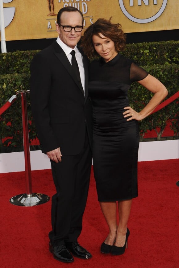 Clark Gregg et sa femme Jennifer Grey aux 20e Screen Actors Guild Awards au Shrine Exposition Center a Los Angeles le 18 janvier 2014