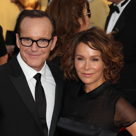 Clark Gregg et sa femme Jennifer Grey aux 20e Screen Actors Guild Awards au Shrine Exposition Center a Los Angeles le 18 janvier 2014