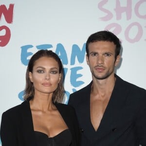 Caroline Receveur et son compagnon Hugo Philip assistent au défilé Etam Live Show 2019 au Stade Roland Garros à Paris le 24 septembre 2019. © Rachid Bellak / Bestimage