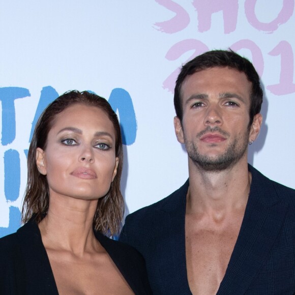 Caroline Receveur et son compagnon Hugo Philip assistent au défilé Etam Live Show 2019 au Stade Roland Garros à Paris le 24 septembre 2019. © Rachid Bellak / Bestimage