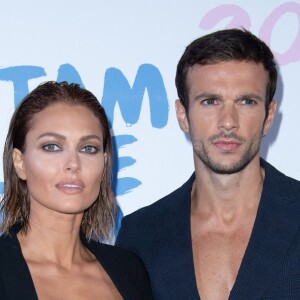 Caroline Receveur et son compagnon Hugo Philip assistent au défilé Etam Live Show 2019 au Stade Roland Garros à Paris le 24 septembre 2019. © Rachid Bellak / Bestimage