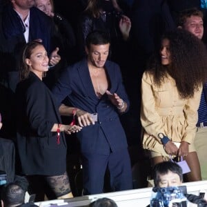 Caroline Receveur, Hugo Philip, Tina Kunakey et Niels Schneider assistent au défilé Etam Live Show 2019 au Stade Roland Garros à Paris le 24 septembre 2019. © Rachid Bellak / Bestimage