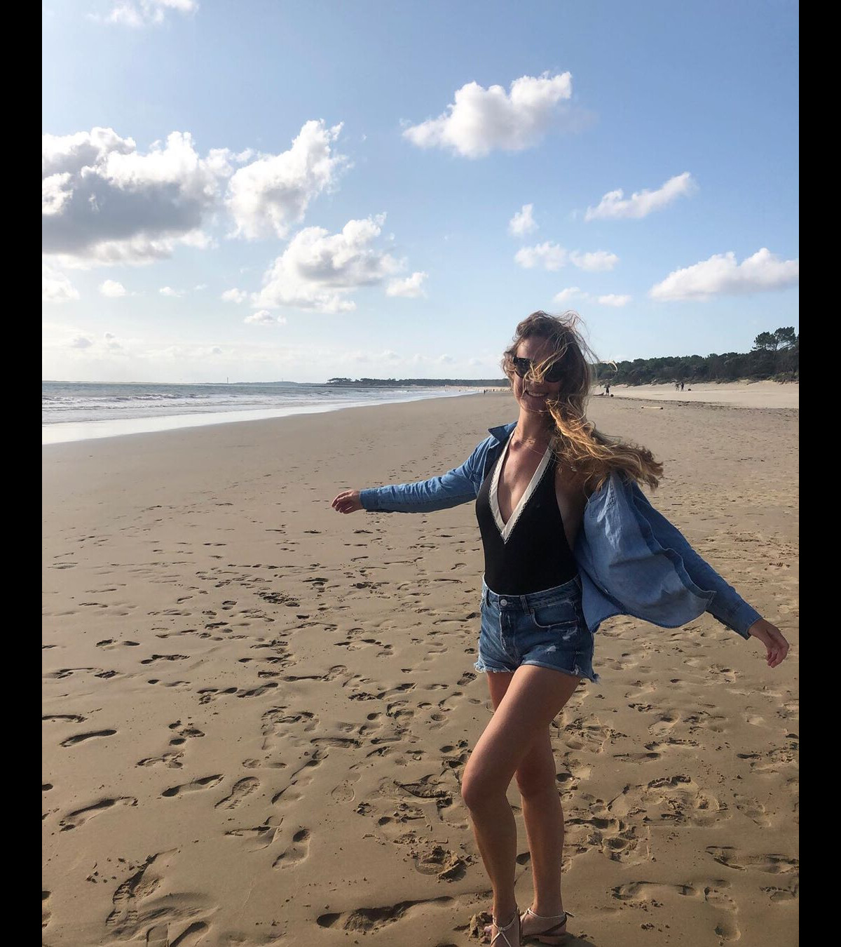 Photo : Rosalie, la fille de Jean-Luc Reichmann, à la plage, le 20 août  2019 - Purepeople