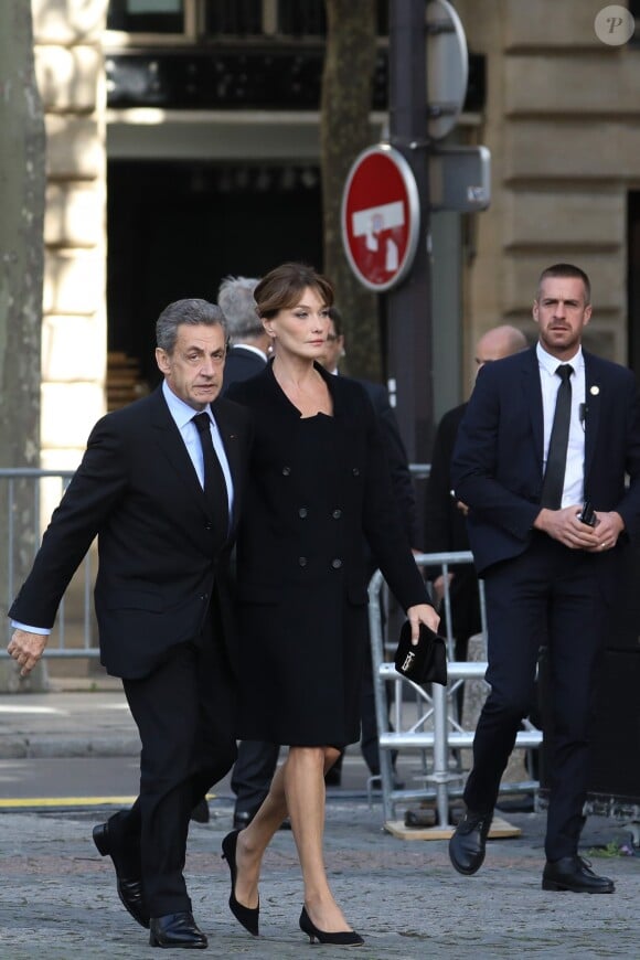 Nicolas Sarkozy et Carla Bruni - Arrivées en l'église Saint-Sulpice pour les obsèques de l'ancien président de la République Jacques Chirac à Paris. Un service solennel sera présidé par le président de la République. Le 30 septembre 2019 © Stéphane Lemouton / Bestimage