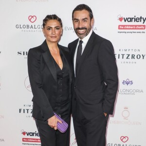 Jessica Lemarie, Robert Pirès au photocall de la soirée "Global Gift Gala" au Kimpton Fitzroy à Londres, le 17 octobre 2019.
