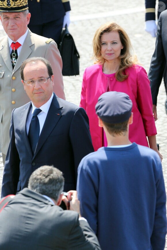 François Hollande et Valérie Trierweiler - Défilé du 14 juillet 2013 à Paris.