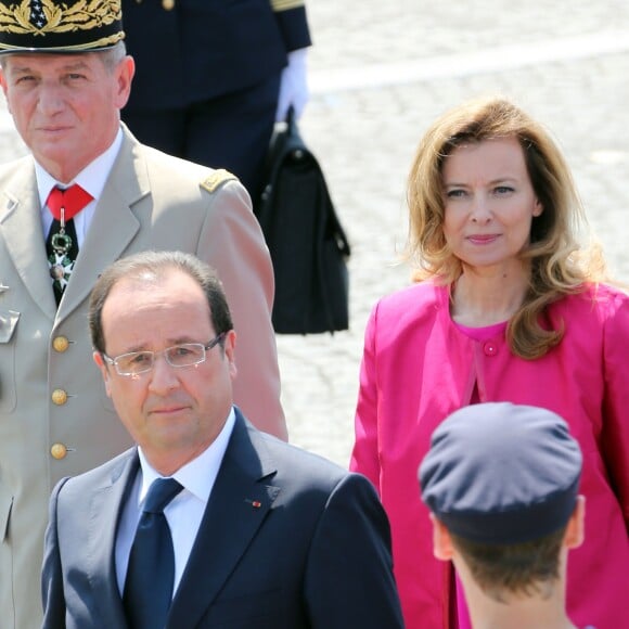 François Hollande et Valérie Trierweiler - Défilé du 14 juillet 2013 à Paris.