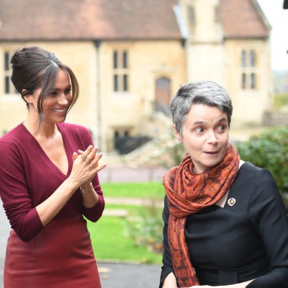 Meghan Markle et le prince Harry arrivent pour une réunion sur l'égalité des genres avec les membres du Queen's Commonwealth Trust (dont elle est vice-présidente) et du sommet One Young World au château de Windsor, le 25 octobre 2019.