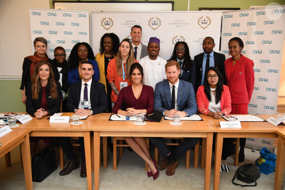 Meghan Markle et le prince Harry participent à une réunion sur l'égalité des genres avec les membres du Queen's Commonwealth Trust (dont elle est vice-présidente) et du sommet One Young World au château de Windsor, le 25 octobre 2019.