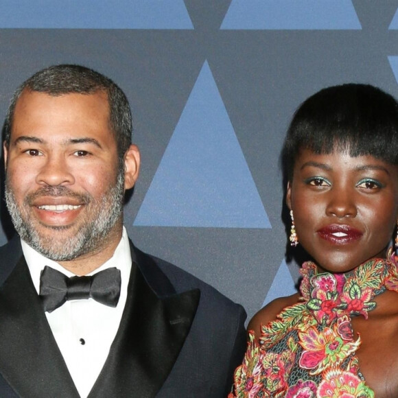 Lupita Nyong'o et Jordan Peele au photocall de la 11ème édition des "Annual Governors Awards" au Hollywood & Highland Center à Los Angeles, le 27 octobre 2019.
