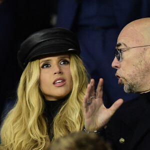 Pascal Obispo et sa femme Julie Hantson dans les tribunes lors du match retour de Champion's League "PSG - Bruges (1-0)" au Parc des Princes. Paris, le 6 novembre 2019.