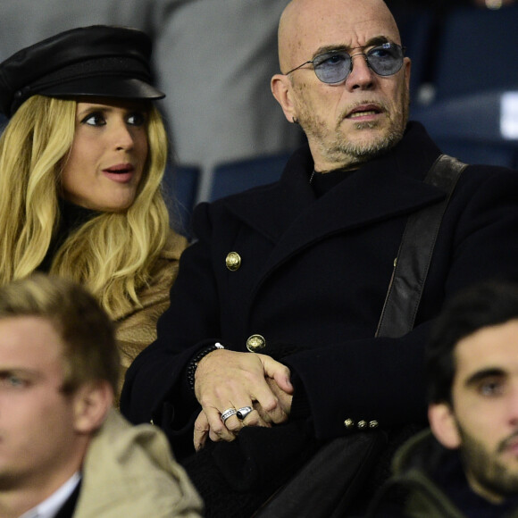 Pascal Obispo et sa femme Julie Hantson dans les tribunes lors du match retour de Champion's League "PSG - Bruges (1-0)" au Parc des Princes. Paris, le 6 novembre 2019.