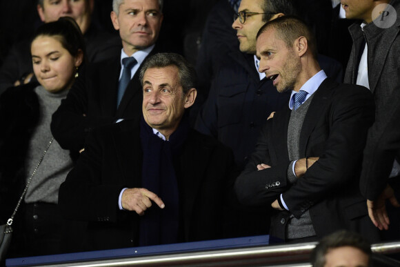 Nicolas Sarkozy et Aleksander Ceferin (président de l'UEFA) dans les tribunes lors du match retour de Champion's League "PSG - Bruges (1-0)" au Parc des Princes. Paris, le 6 novembre 2019.
