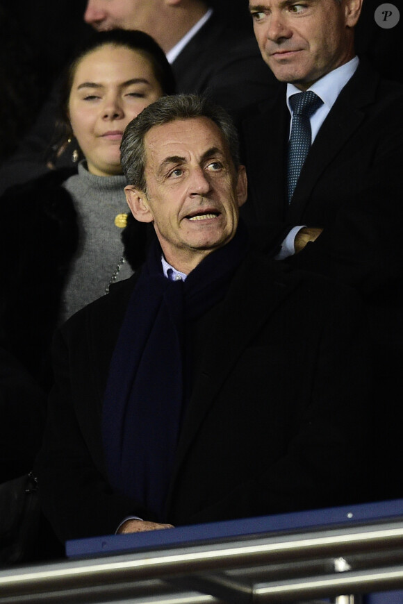 Jean-Claude Blanc (directeur général délégue du PSG), Nicolas Sarkozy dans les tribunes lors du match retour de Champion's League "PSG - Bruges (1-0)" au Parc des Princes. Paris, le 6 novembre 2019.